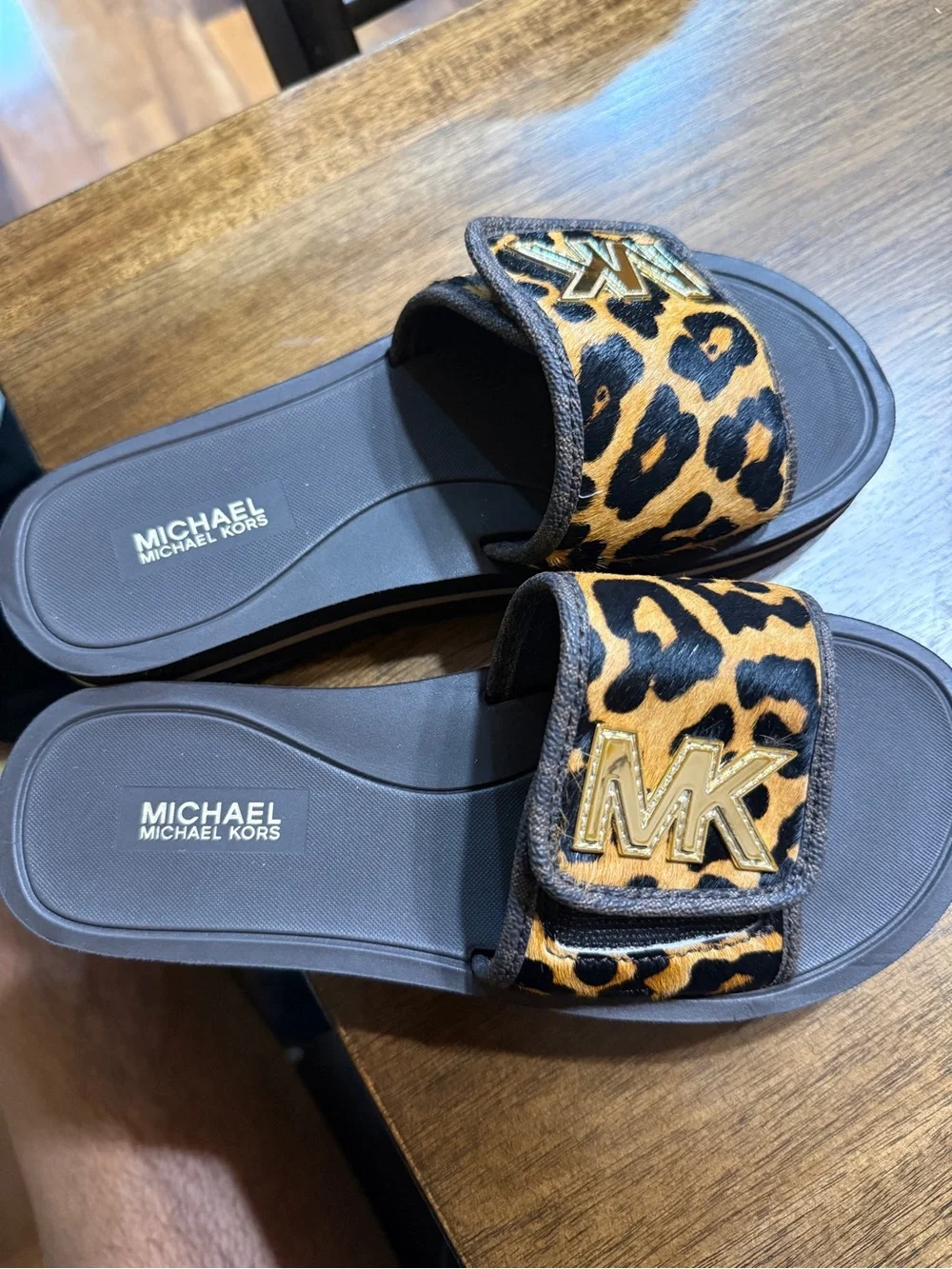 MICHAEL Michael Kors Black Footbed Leopard Print Slide Sandals with Gold MK Logo